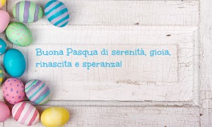 Easter eggs painted in pastel colors on a white cracked antique background